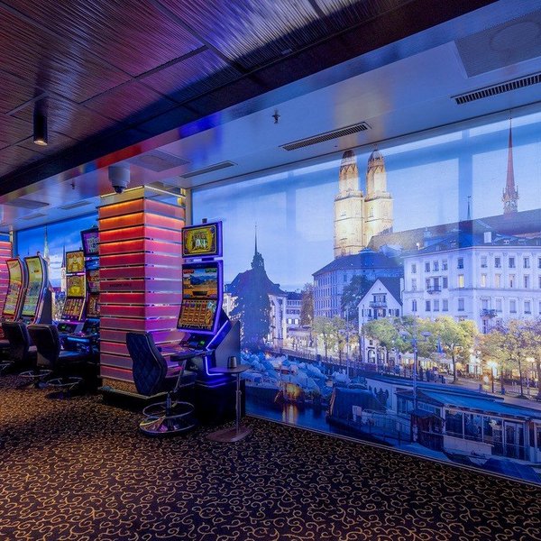 Window tension frame with photos of the city of Zurich.